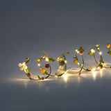 LIGHT CHAIN W EASTER EGGS AND LEAVES
