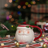 MUG W RED HANDLE & EDGE W SANTA HEAD WITH DETAIL 380ML