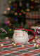 MUG W RED HANDLE & EDGE W SANTA HEAD WITH DETAIL 380ML