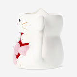 MUG SHAPED AS CAT HOLDING A HEART WITH BOW