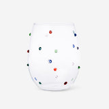 Drinking glass with multi coloured dots 
