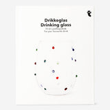 Drinking glass with multi coloured dots 