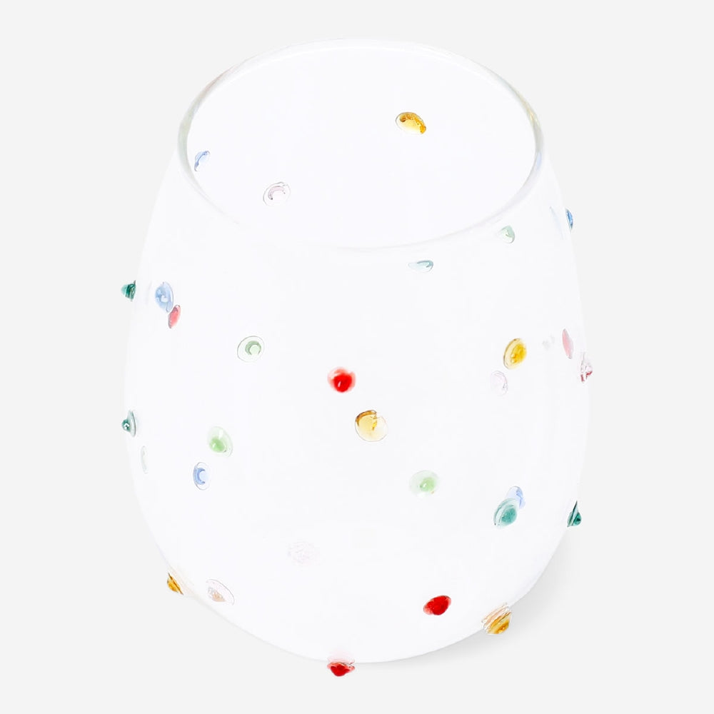 Drinking glass with multi coloured dots 