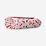 Quilted picnic blanket with berry print and carrying strap - 130x150 cm