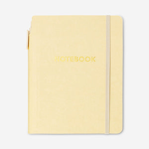 Butter yellow notebook with ballpoint pen