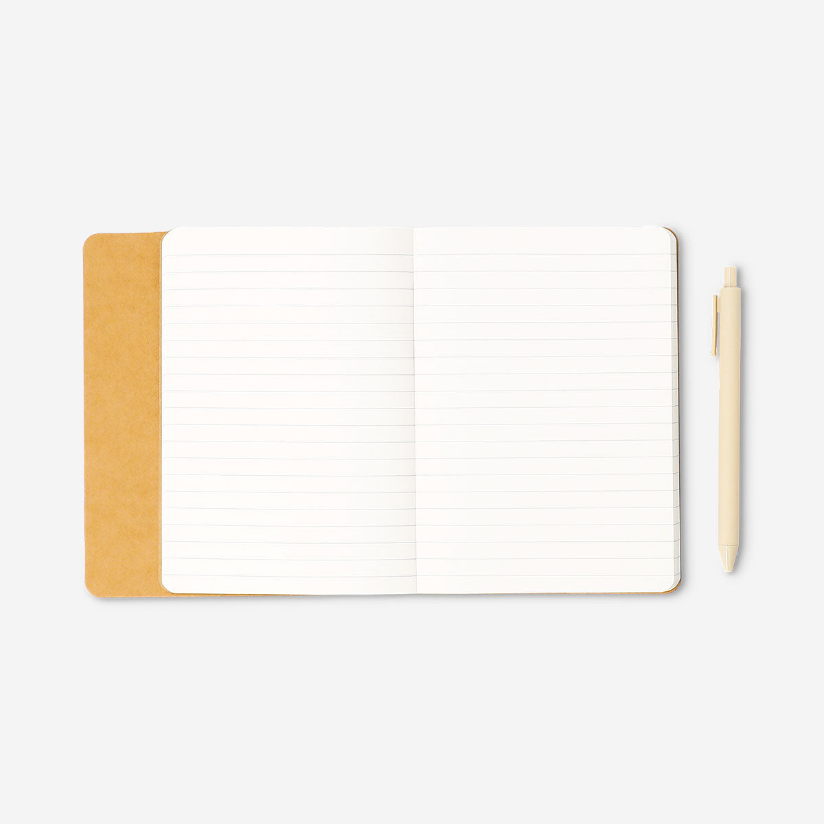 Butter yellow notebook with ballpoint pen
