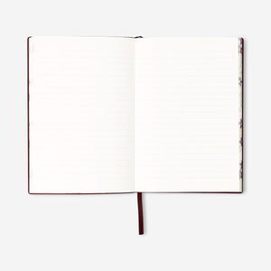 Burgundy notebook with text 