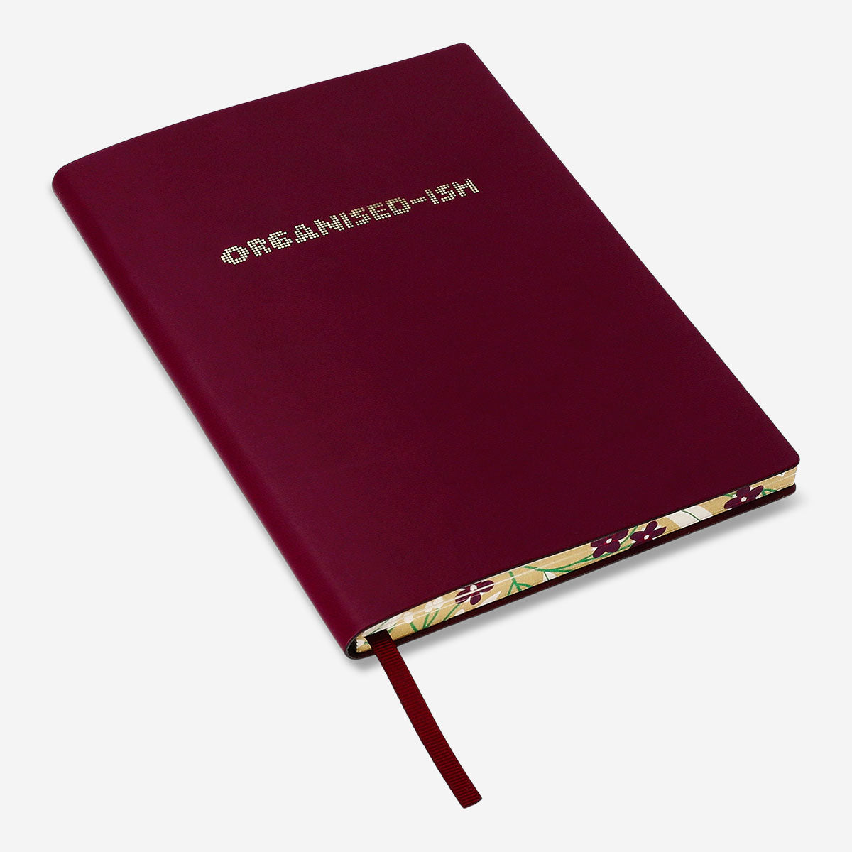 Burgundy notebook with text 