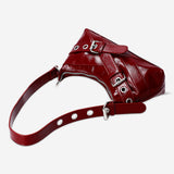 Red shoulder bag with buckles