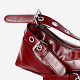 Red shoulder bag with buckles