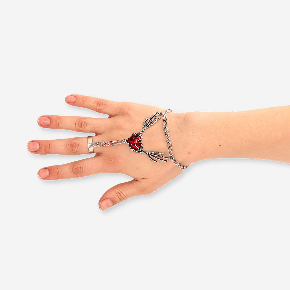 Silver hand jewellery with red heart 