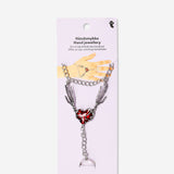 Silver hand jewellery with red heart 