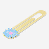 Gold metal ruler with flower