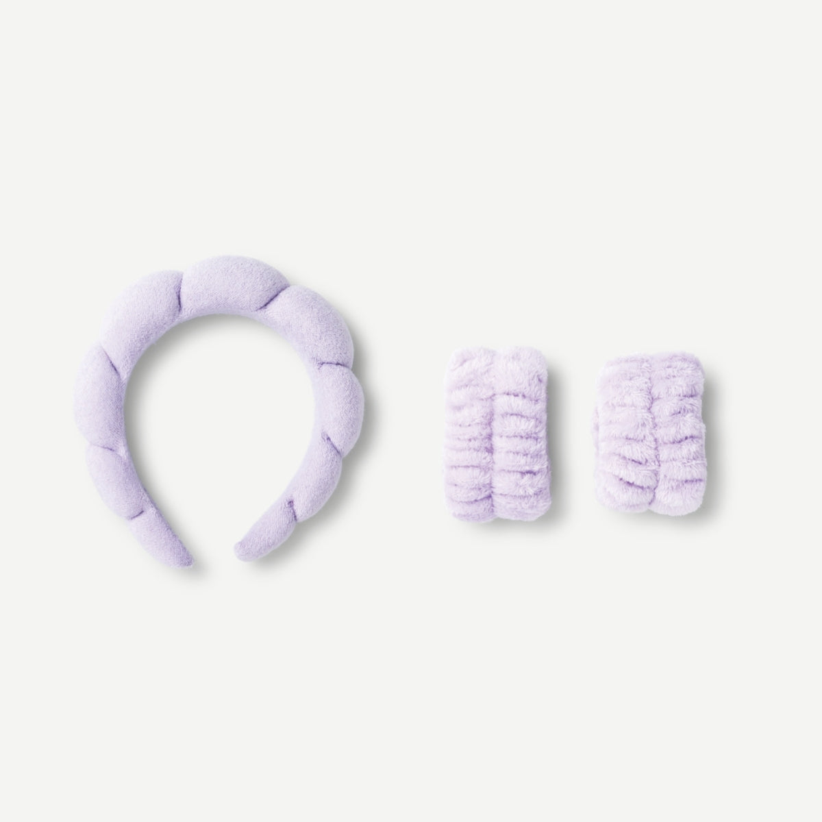 Purple headband and armbands for makeup and skincare 
