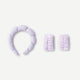 Purple headband and armbands for makeup and skincare 