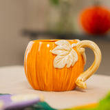 MUG WITH HANDLE PUMPKIN SHAPE AND LEAF DESIGN